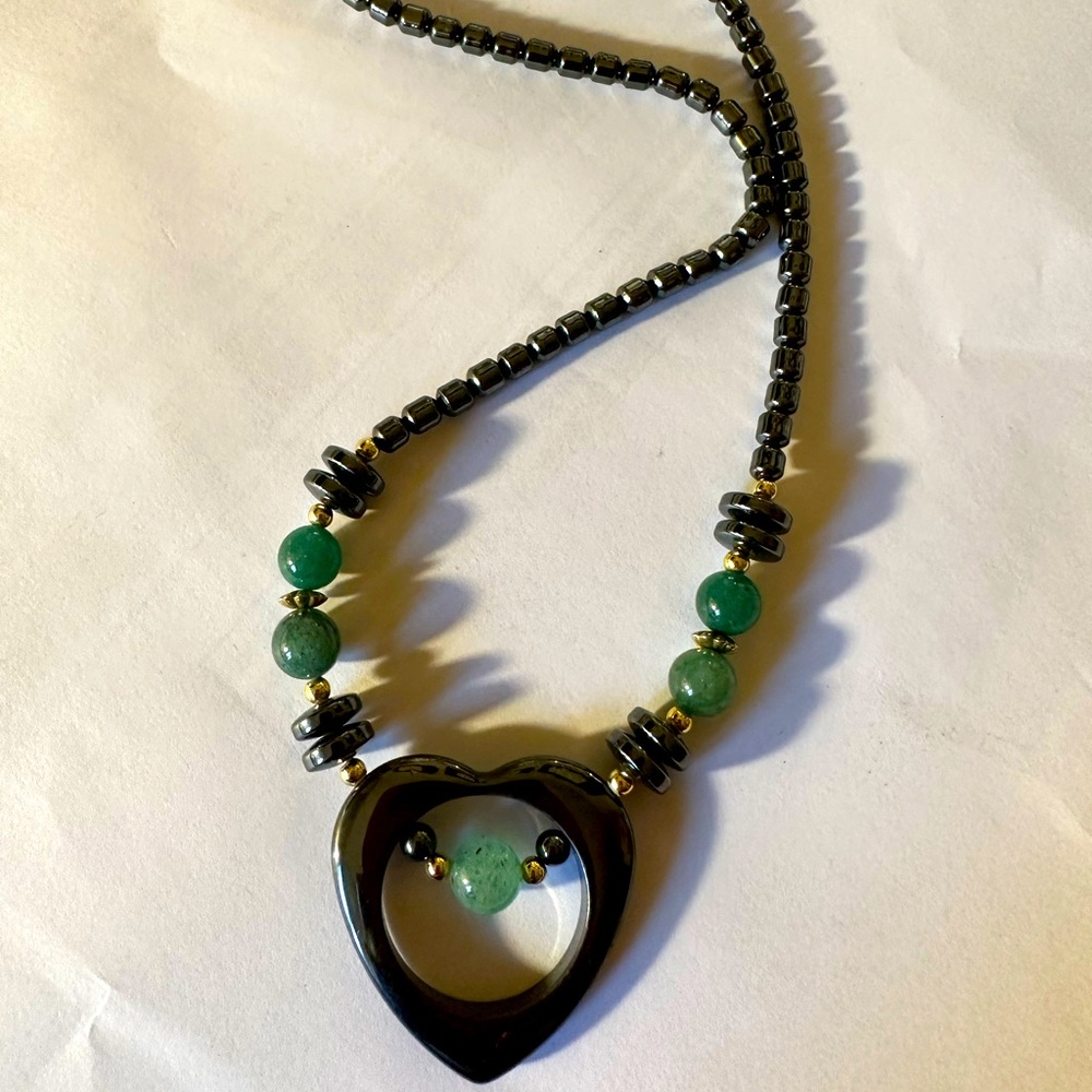 Hematite, Jade, and gold accent beaded necklace.